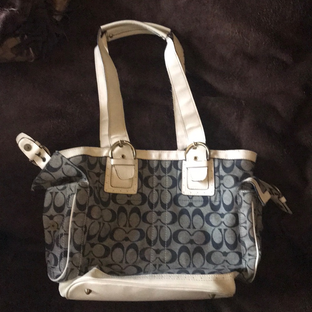 Blue and white loved coach purse.
